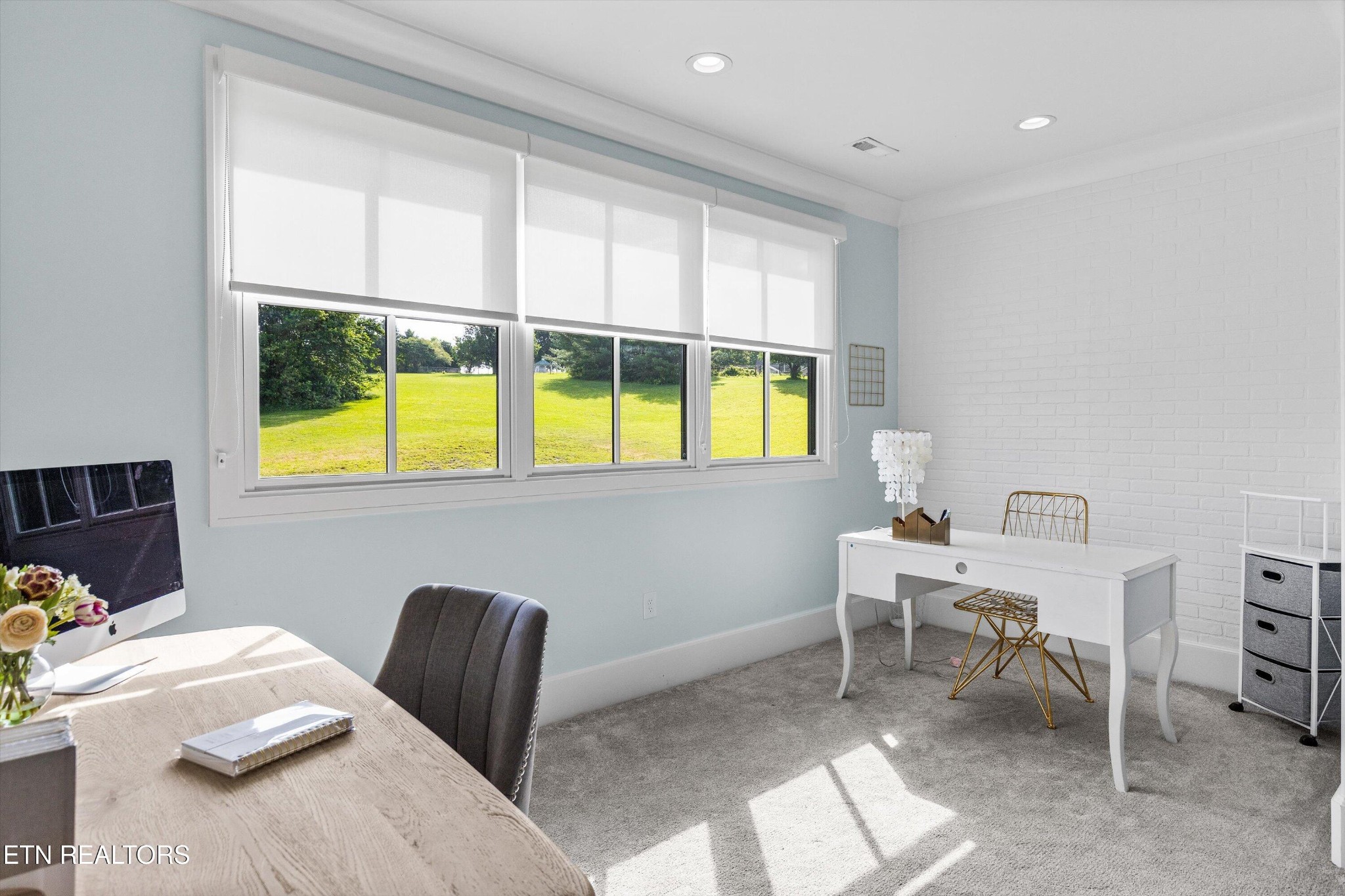 1748 Raulston Road Maryville, TN 37803 - Photo 35 of 59 a view of a workspace with furniture and a window