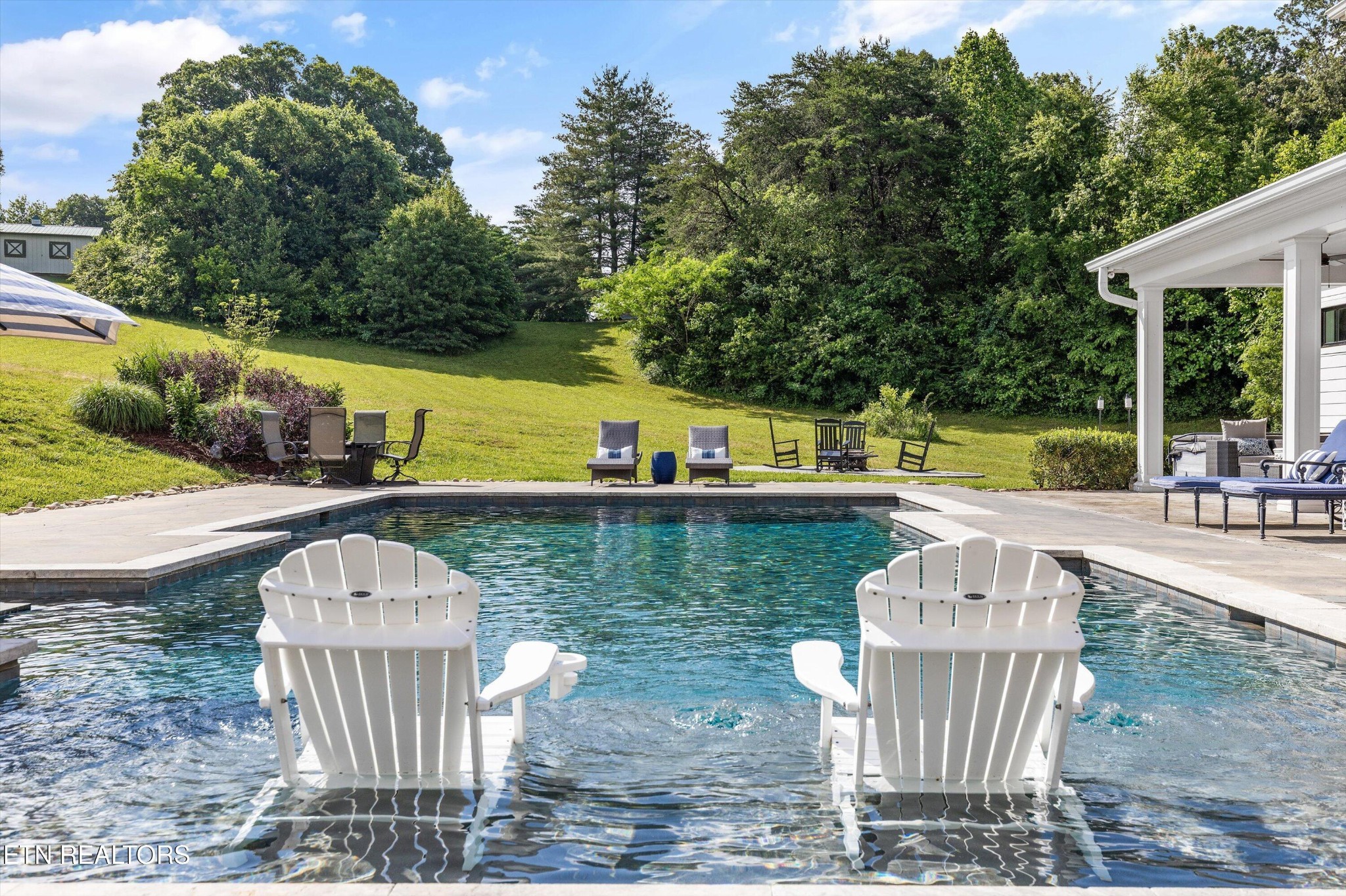 1748 Raulston Road Maryville, TN 37803 - Photo 39 of 59 a view of a lake with a patio and a yard