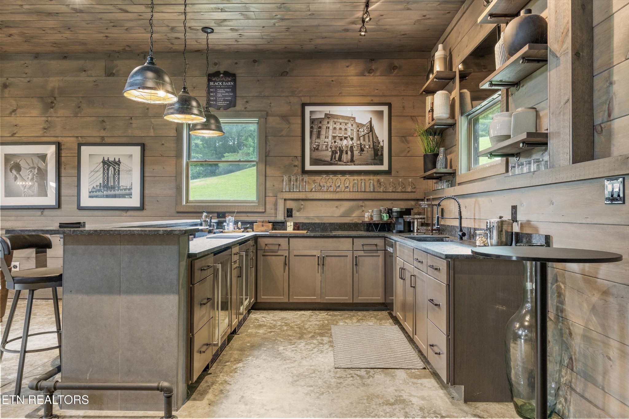 1748 Raulston Road Maryville, TN 37803 - Photo 49 of 59 a kitchen with granite countertop a sink stove and cabinets