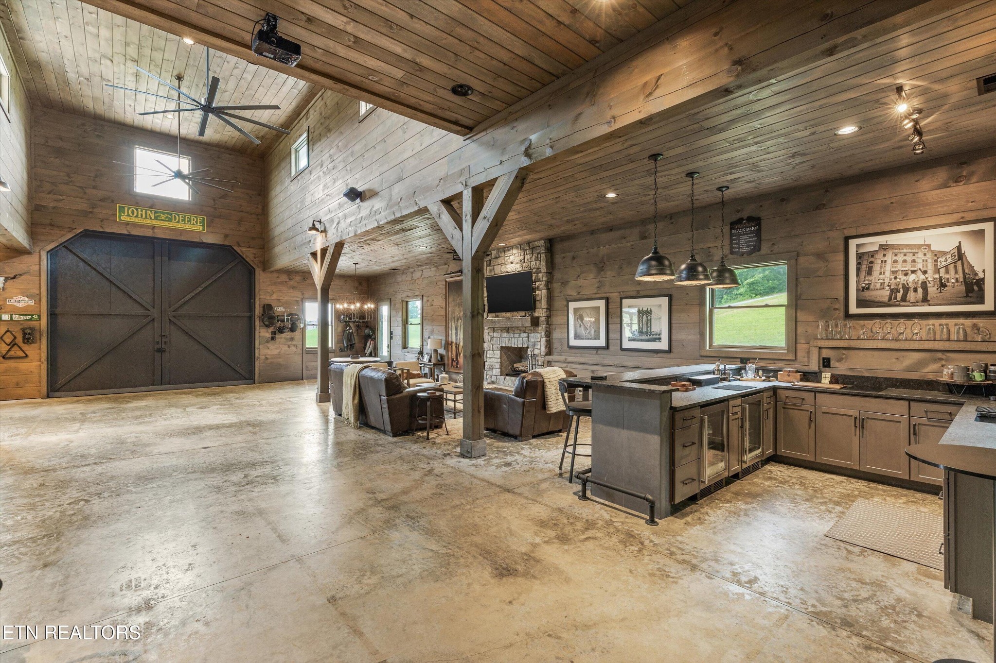 1748 Raulston Road Maryville, TN 37803 - Photo 50 of 59 a living room with furniture and a flat screen tv