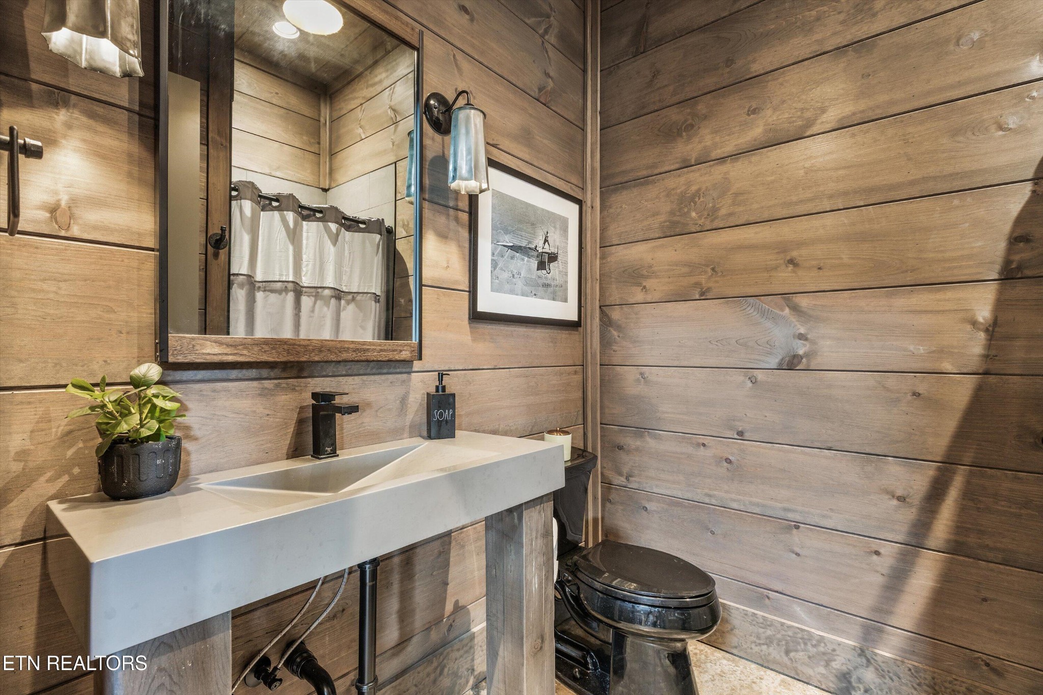 1748 Raulston Road Maryville, TN 37803 - Photo 51 of 59 a bathroom with a sink and a shower