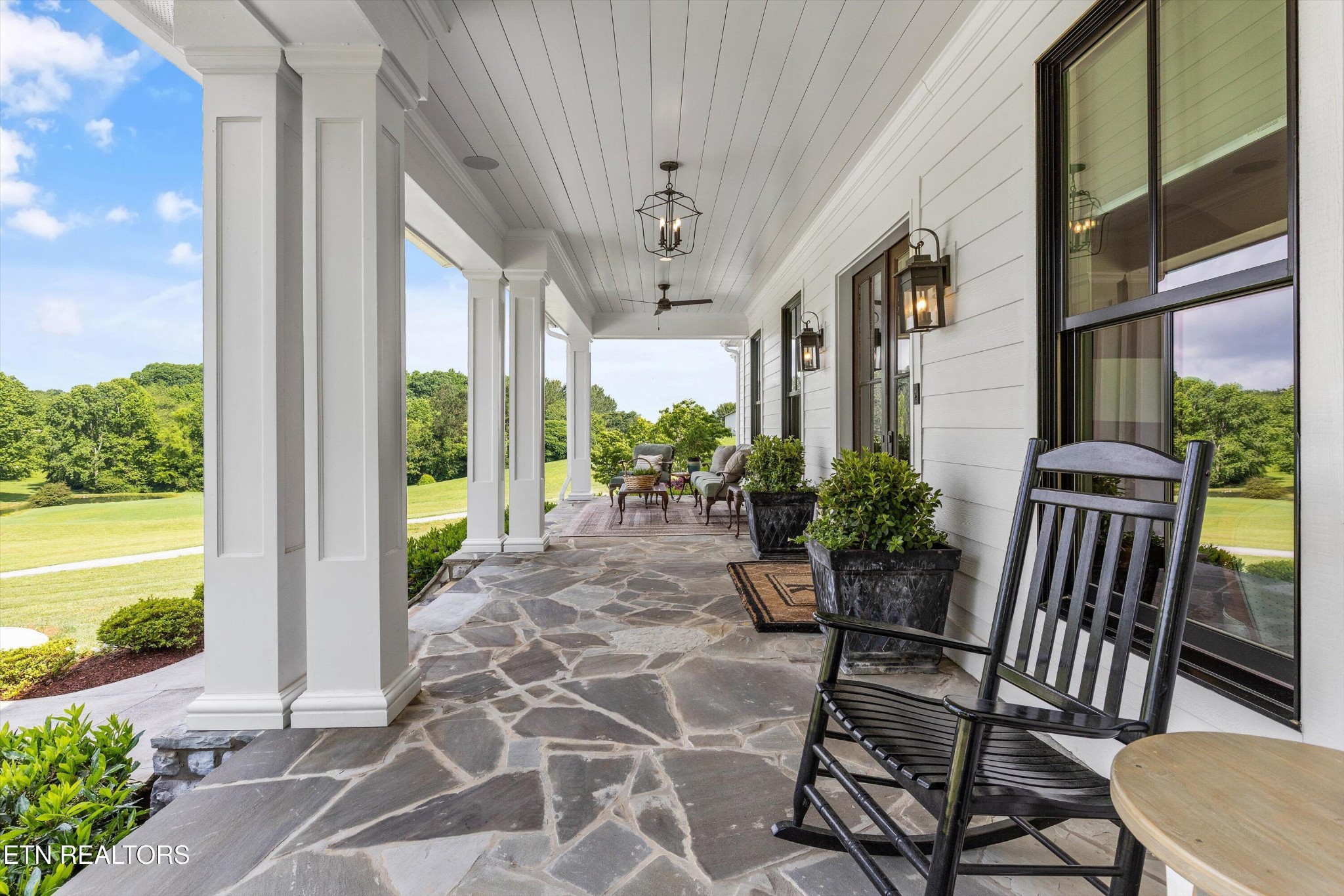 1748 Raulston Road Maryville, TN 37803 - Photo 6 of 59 a view of an outdoor dining space with furniture and garden view
