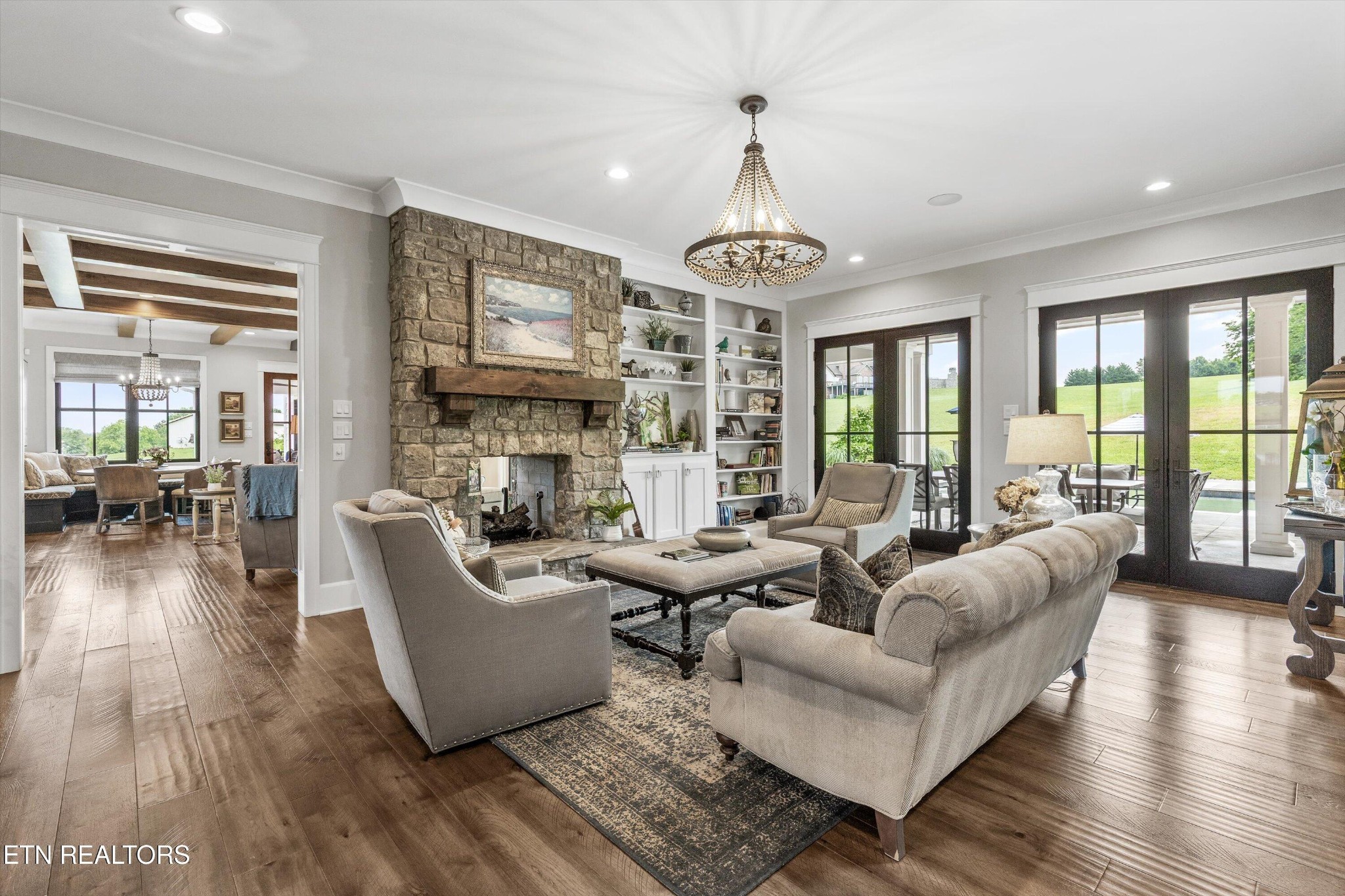 1748 Raulston Road Maryville, TN 37803 - Photo 9 of 59 a living room with furniture ceiling fan and a wooden floor