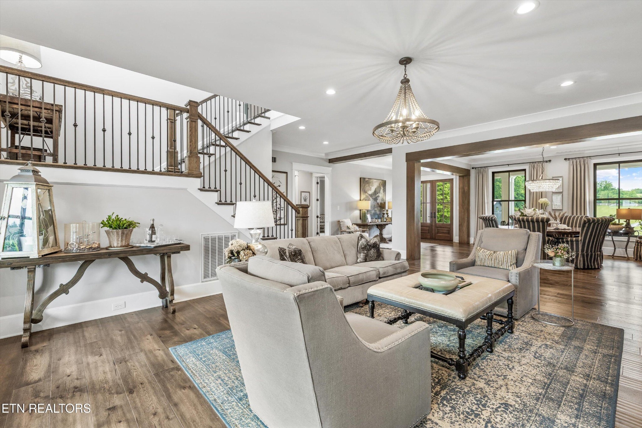 1748 Raulston Road Maryville, TN 37803 - Photo 10 of 59 a living room with furniture a table and wooden floor