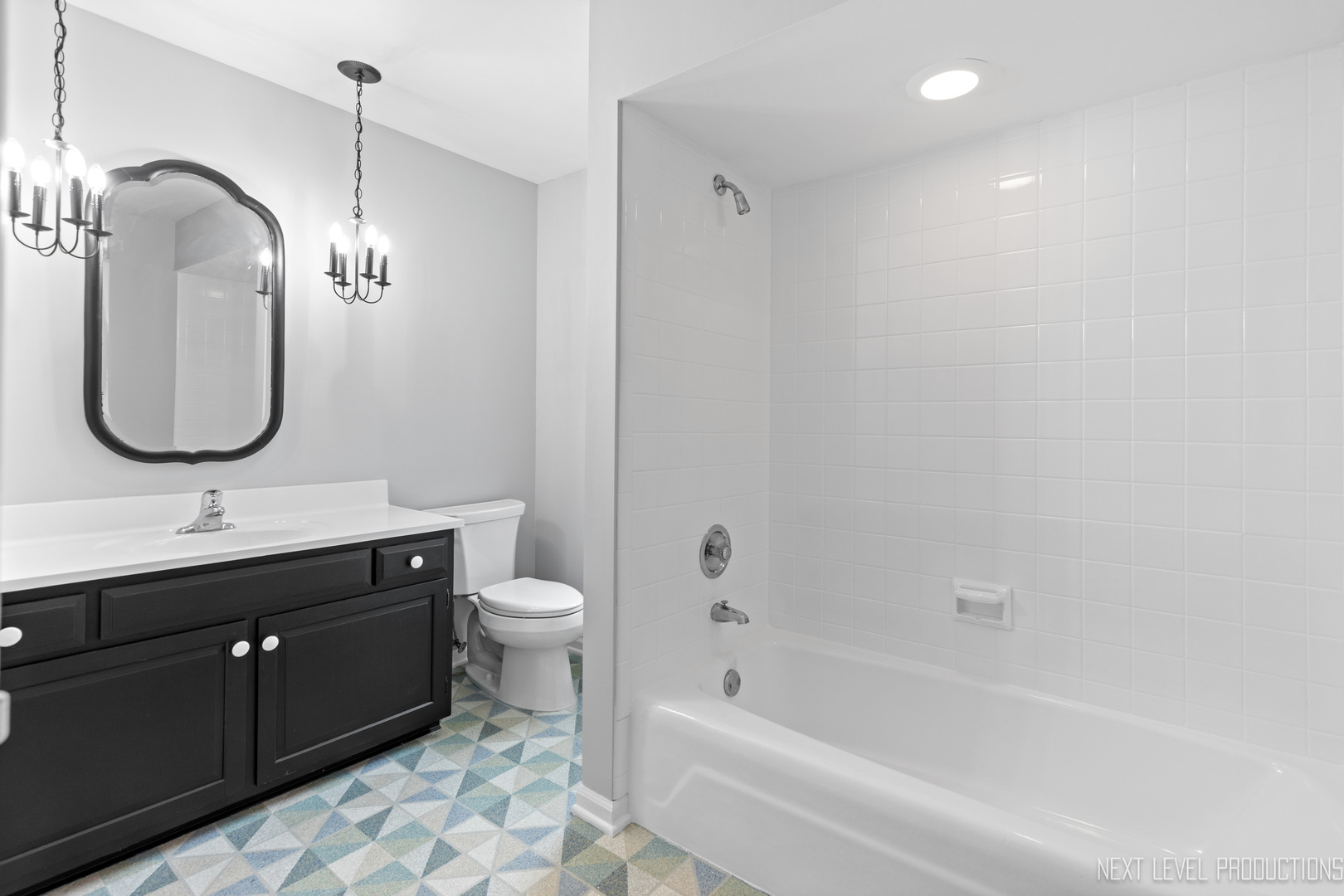 N235 Winfield Road Winfield, IL 60190 - Photo 17 of 37 a bathroom with a double vanity sink toilet mirror and bathtub
