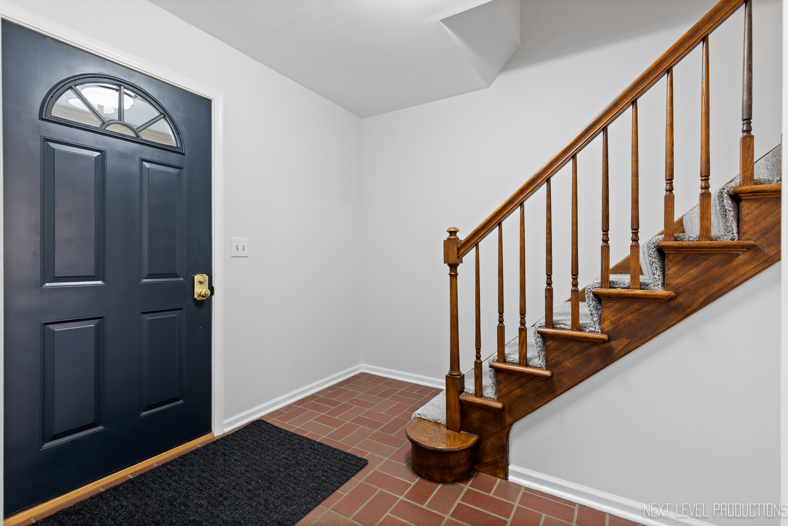 N235 Winfield Road Winfield, IL 60190 - Photo 28 of 37 a view of an entryway with wooden floor and door