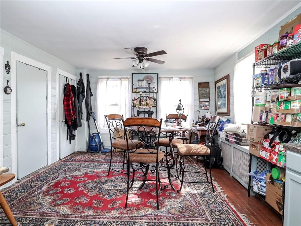 636 Holmdel Road Hazlet, NJ 07730 - Photo 16 of 47 a living room with furniture and a book shelf