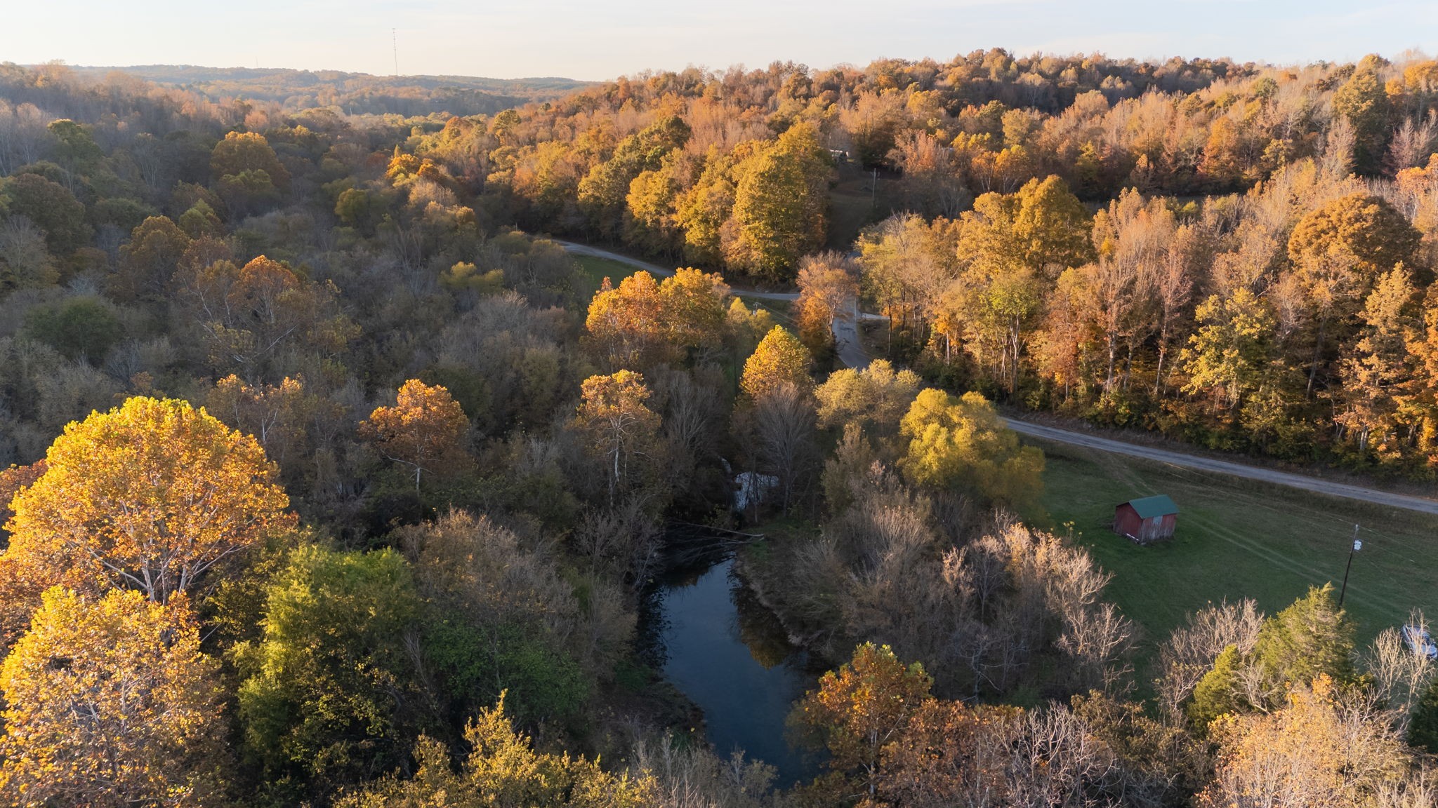 0 Short Creek Road Linden, TN 37096 - Photo 40 of 49 a view of a lake in middle of forest
