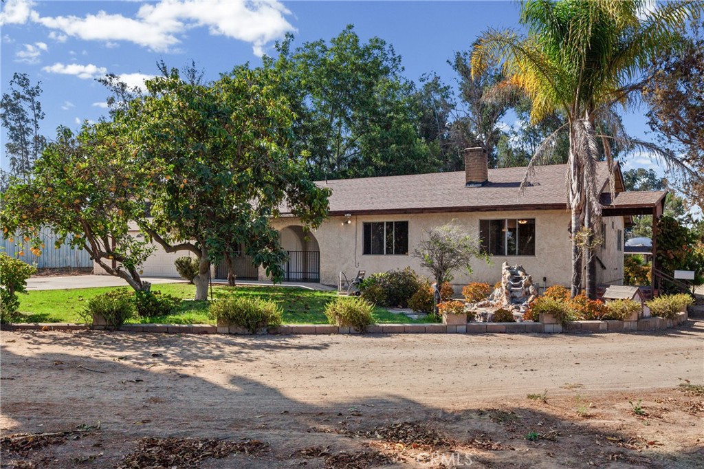 735 Orchard Road Nipomo, CA 93444 - Photo 6 of 49 The driveway continues around to the back of the house.