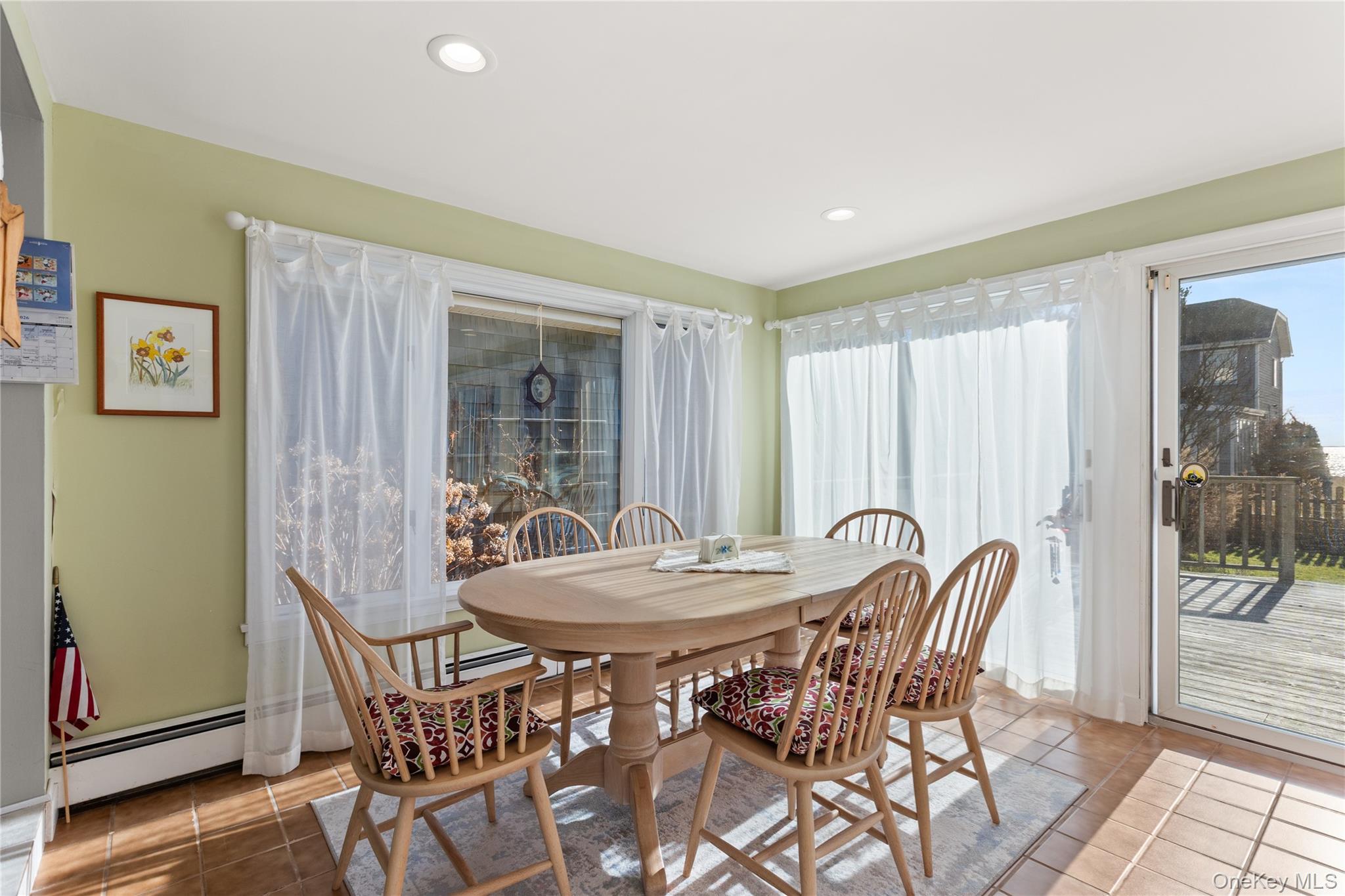 5 A Bay Road East Patchogue, NY 11772 - Photo 19 of 27 Dining area with tile patterned floors