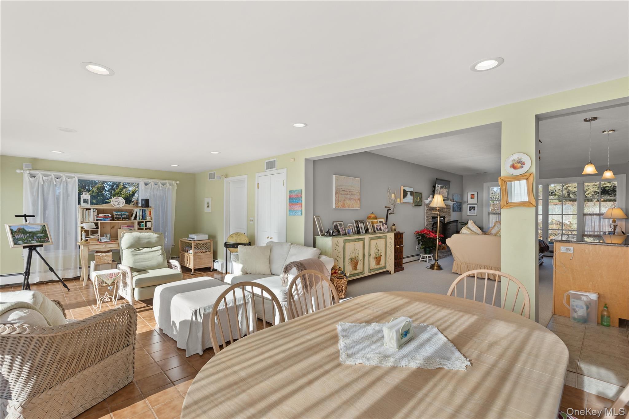 5 A Bay Road East Patchogue, NY 11772 - Photo 22 of 27 Tiled dining room featuring recessed lighting