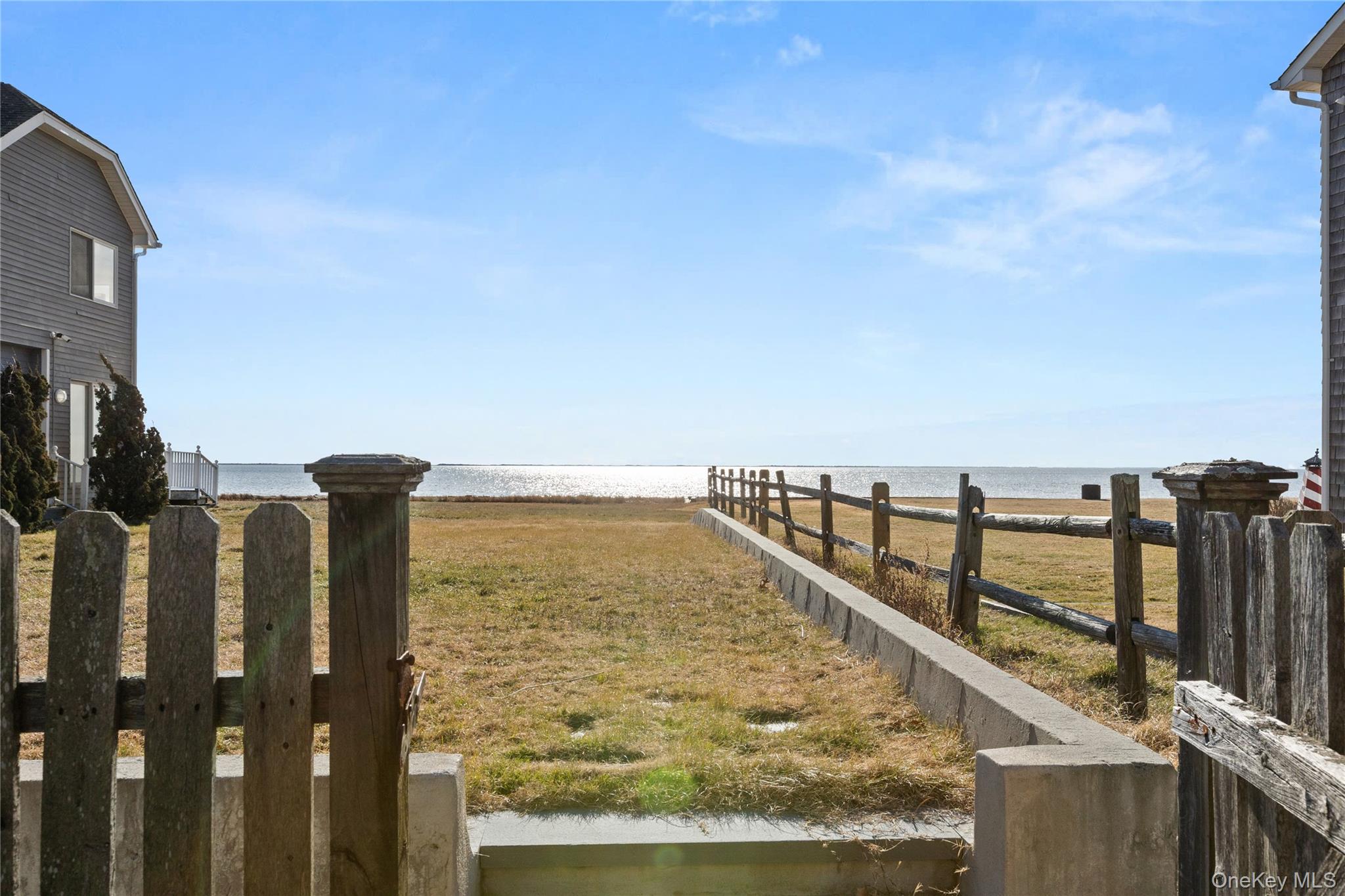 5 A Bay Road East Patchogue, NY 11772 - Photo 25 of 27 View of yard featuring a water view