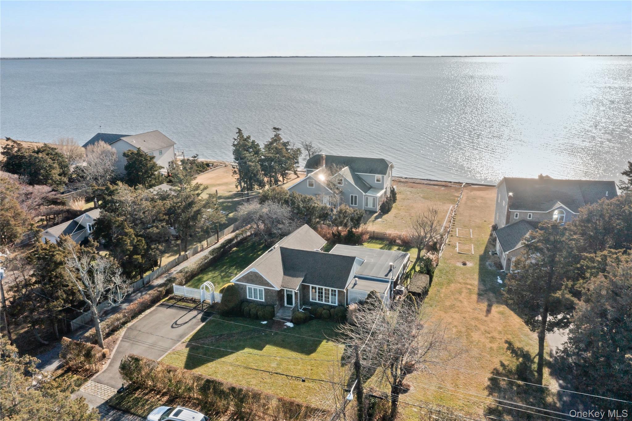 5 A Bay Road East Patchogue, NY 11772 - Photo 3 of 27 Aerial view of property and surrounding area with a nearby body of water
