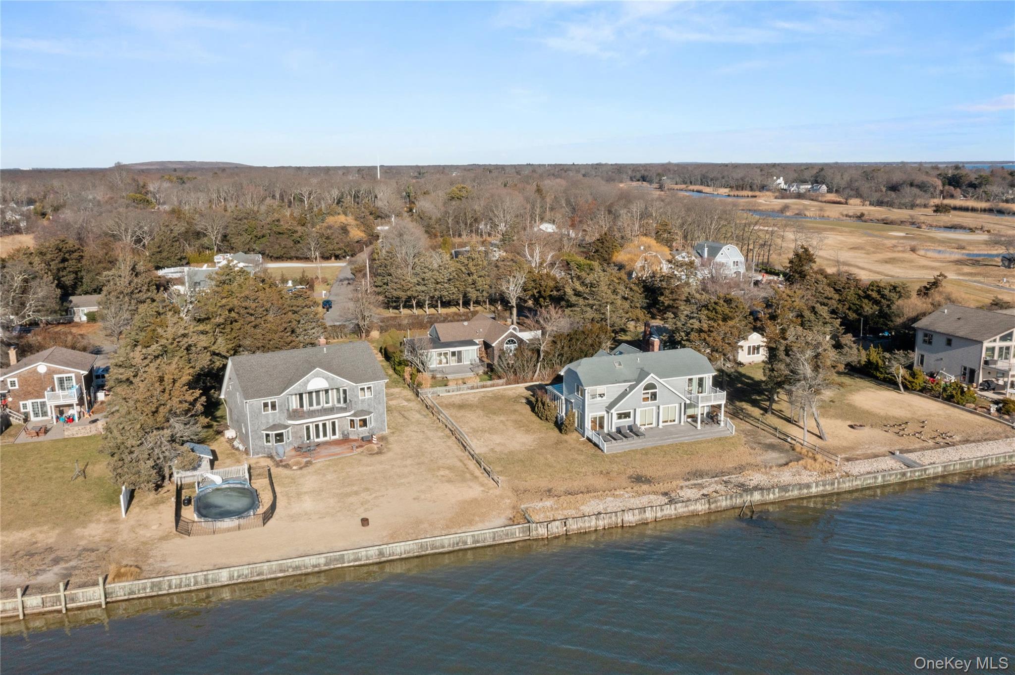 5 A Bay Road East Patchogue, NY 11772 - Photo 6 of 27 Aerial overview of property's location with a nearby body of water and nearby suburban area