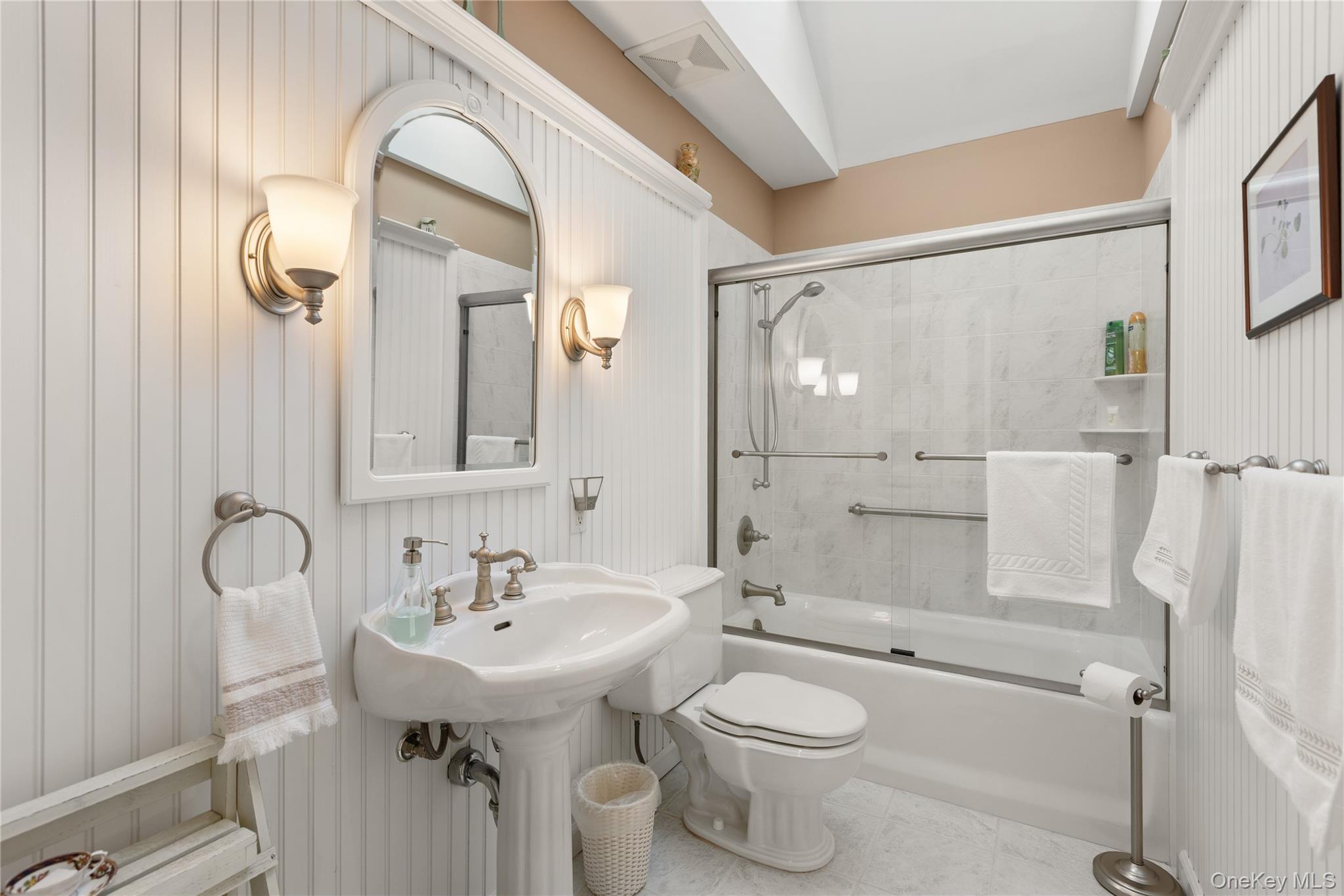 5 A Bay Road East Patchogue, NY 11772 - Photo 10 of 27 Bathroom featuring bath / shower combo with glass door and tile patterned floors