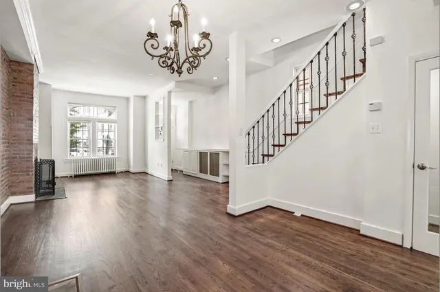 a view of entryway with wooden floor