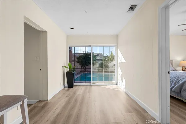 a view of a swimming pool with a yard