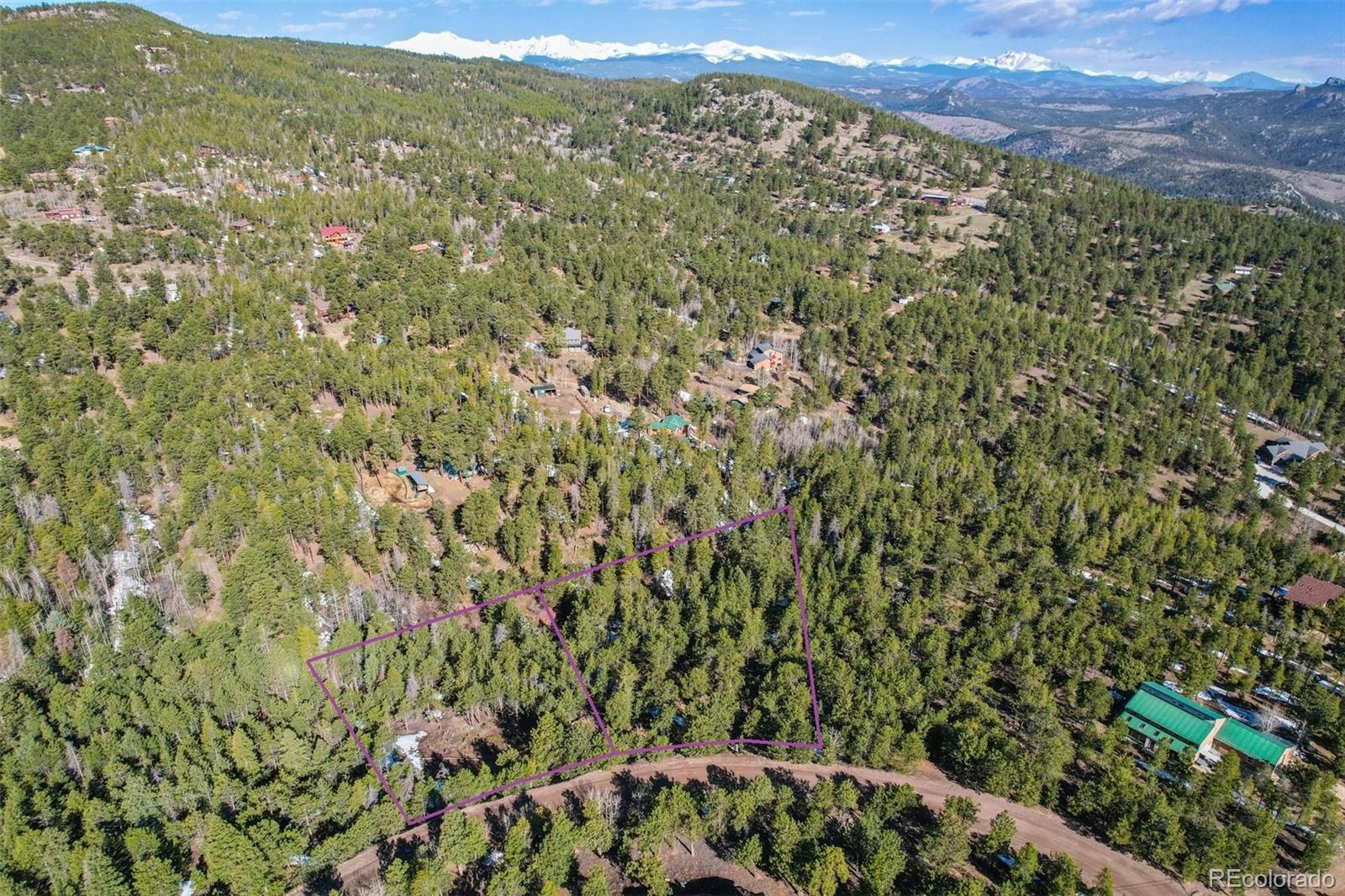 854 Crescent Lake Road Golden, CO 80403 - Photo 5 of 11 a view of a green field