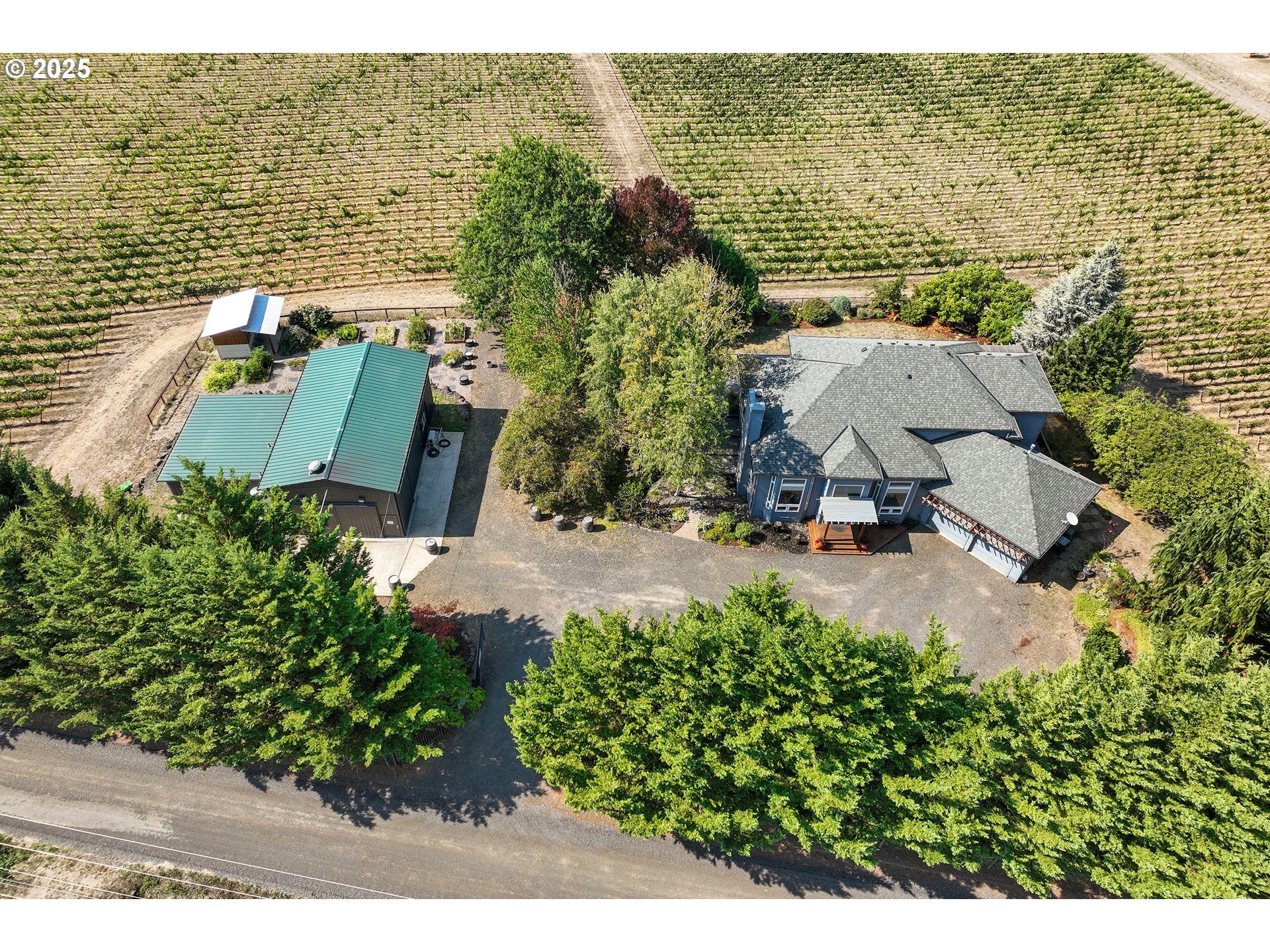 an aerial view of a house with lake view