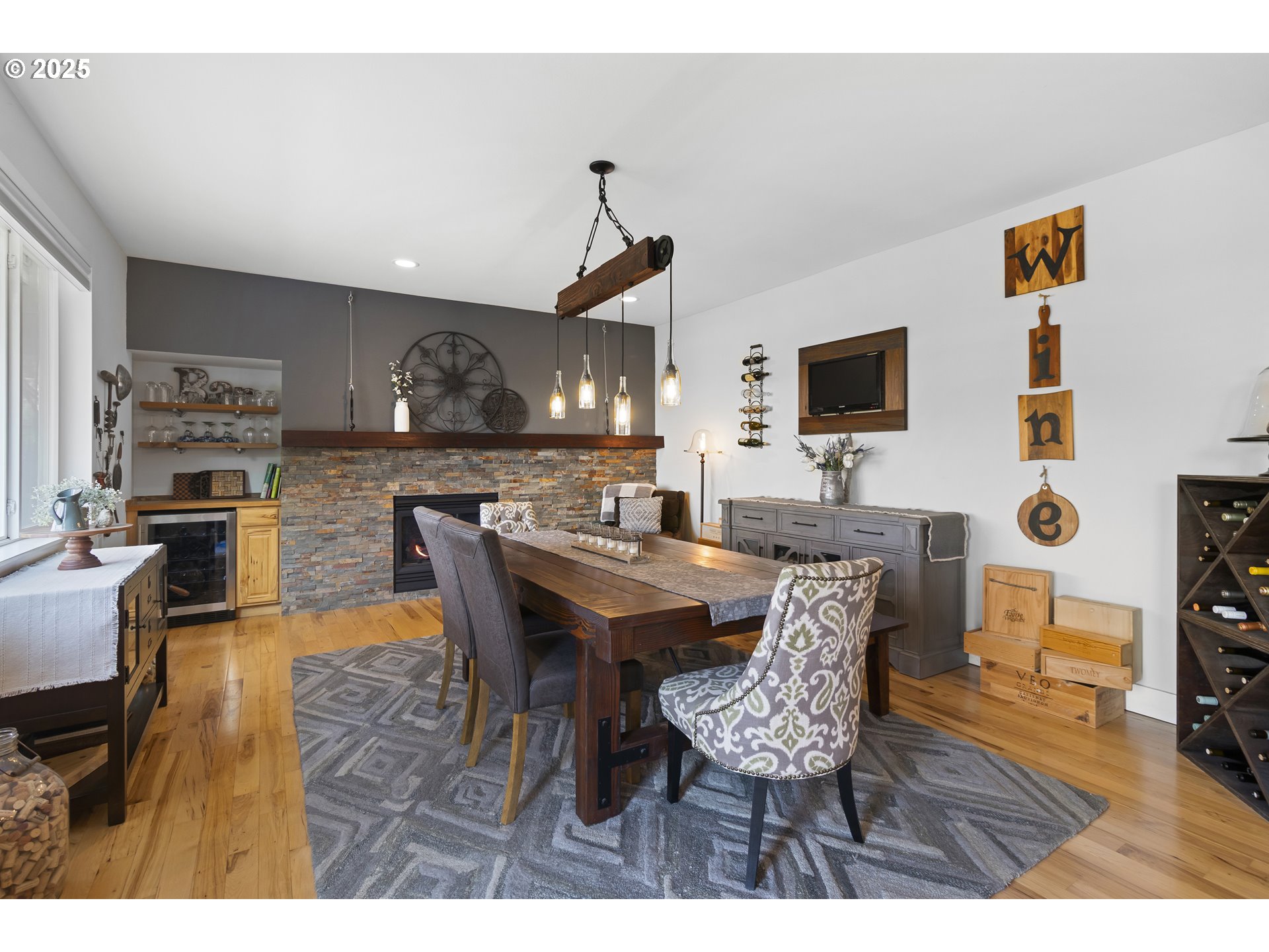 13631 Northeast Kinney Road Newberg, OR 97132 - Photo 12 of 48 a view of a dining room with furniture and wooden floor