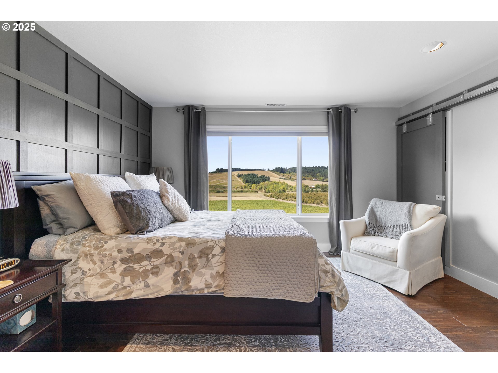 13631 Northeast Kinney Road Newberg, OR 97132 - Photo 17 of 48 a bedroom with a bed and a couch