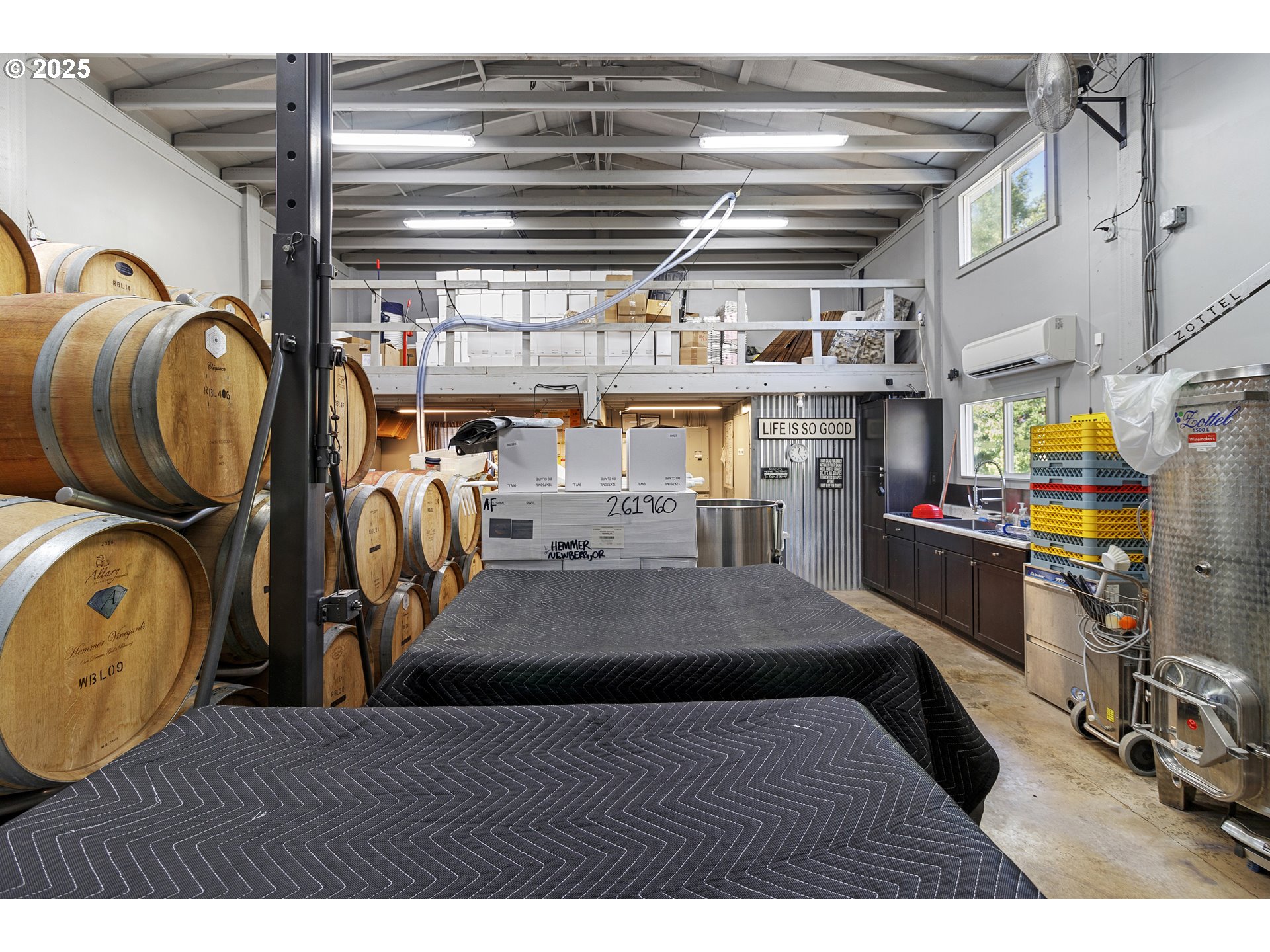 13631 Northeast Kinney Road Newberg, OR 97132 - Photo 31 of 48 a view of gym equipment and kitchen view