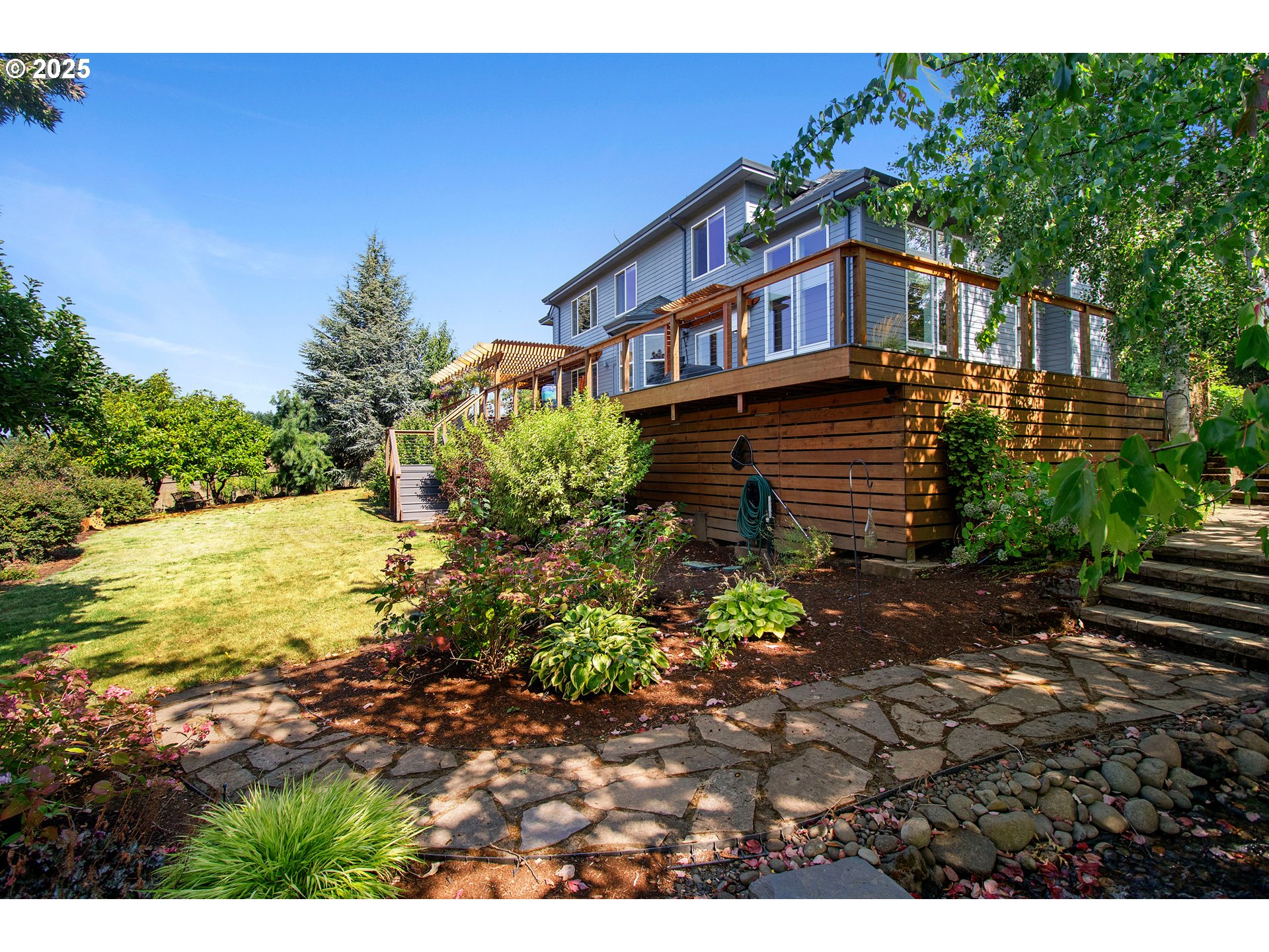 13631 Northeast Kinney Road Newberg, OR 97132 - Photo 44 of 48 a view of a house with a yard