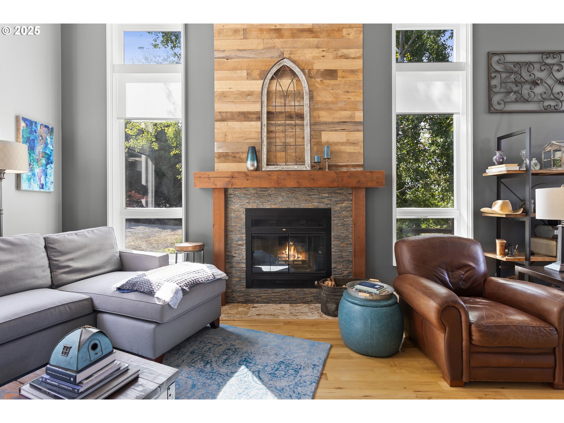 13631 Northeast Kinney Road Newberg, OR 97132 - Photo 6 of 48 a living room with furniture and a fireplace