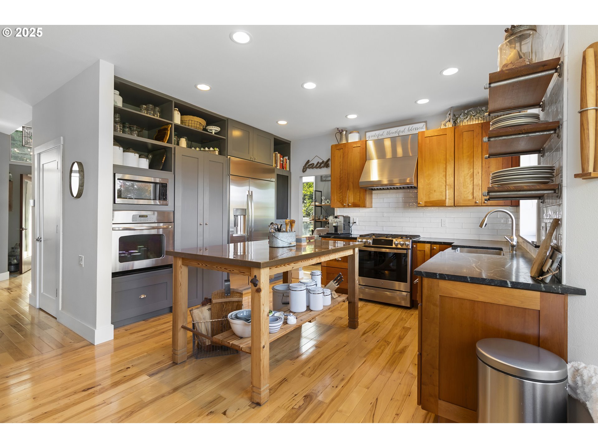 13631 Northeast Kinney Road Newberg, OR 97132 - Photo 10 of 48 a kitchen with a sink appliances and cabinets