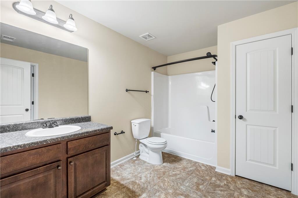 12 Juno Street Fort Mitchell, AL 36856 - Photo 35 of 43 Full bathroom featuring vanity and tub / shower combination