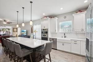 5204 69th Street East Palmetto, FL 34221 - Photo 3 of 11 a large kitchen with a table and chairs