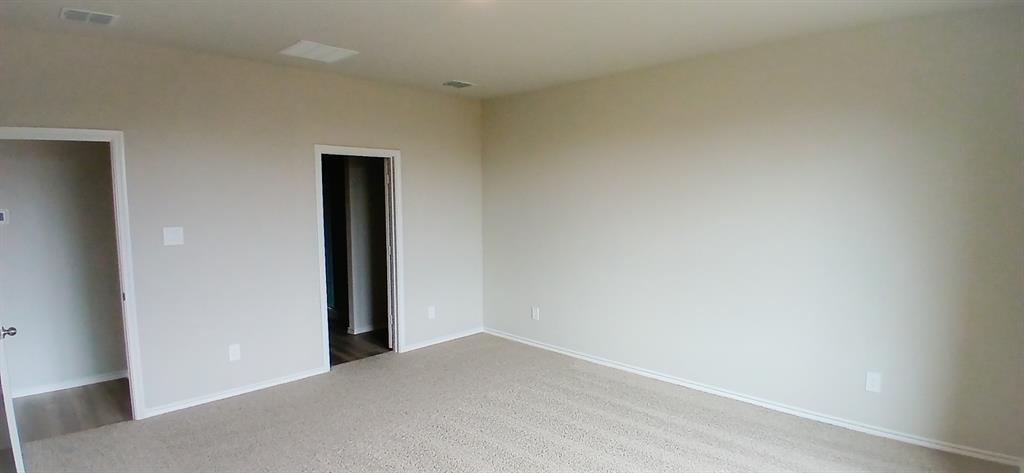 309 Potato Street Keene, TX 76059 - Photo 3 of 16 a view of an empty room and closet