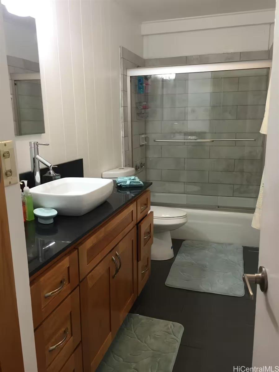 953 Ailuna Street Honolulu, HI 96821 - Photo 7 of 25 a bathroom with a sink a toilet and shower