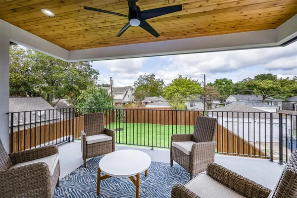 a view of a chairs on the roof deck