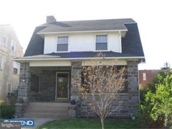 6 Church Road Ardmore, PA 19003 - Photo 1 of 12 a building view with a brick wall