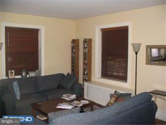 6 Church Road Ardmore, PA 19003 - Photo 3 of 12 a living room with furniture and a window
