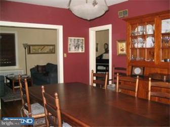 6 Church Road Ardmore, PA 19003 - Photo 4 of 12 a view of a livingroom with furniture and a flat screen tv