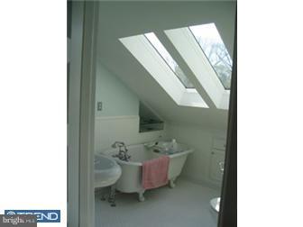 6 Church Road Ardmore, PA 19003 - Photo 7 of 12 a bathroom with a sink and mirror