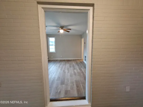 a bathroom with a shower and a bath tub