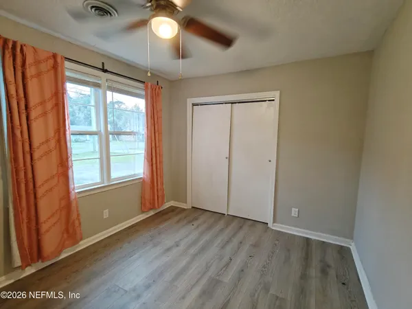 a bathroom with a shower and a bath tub