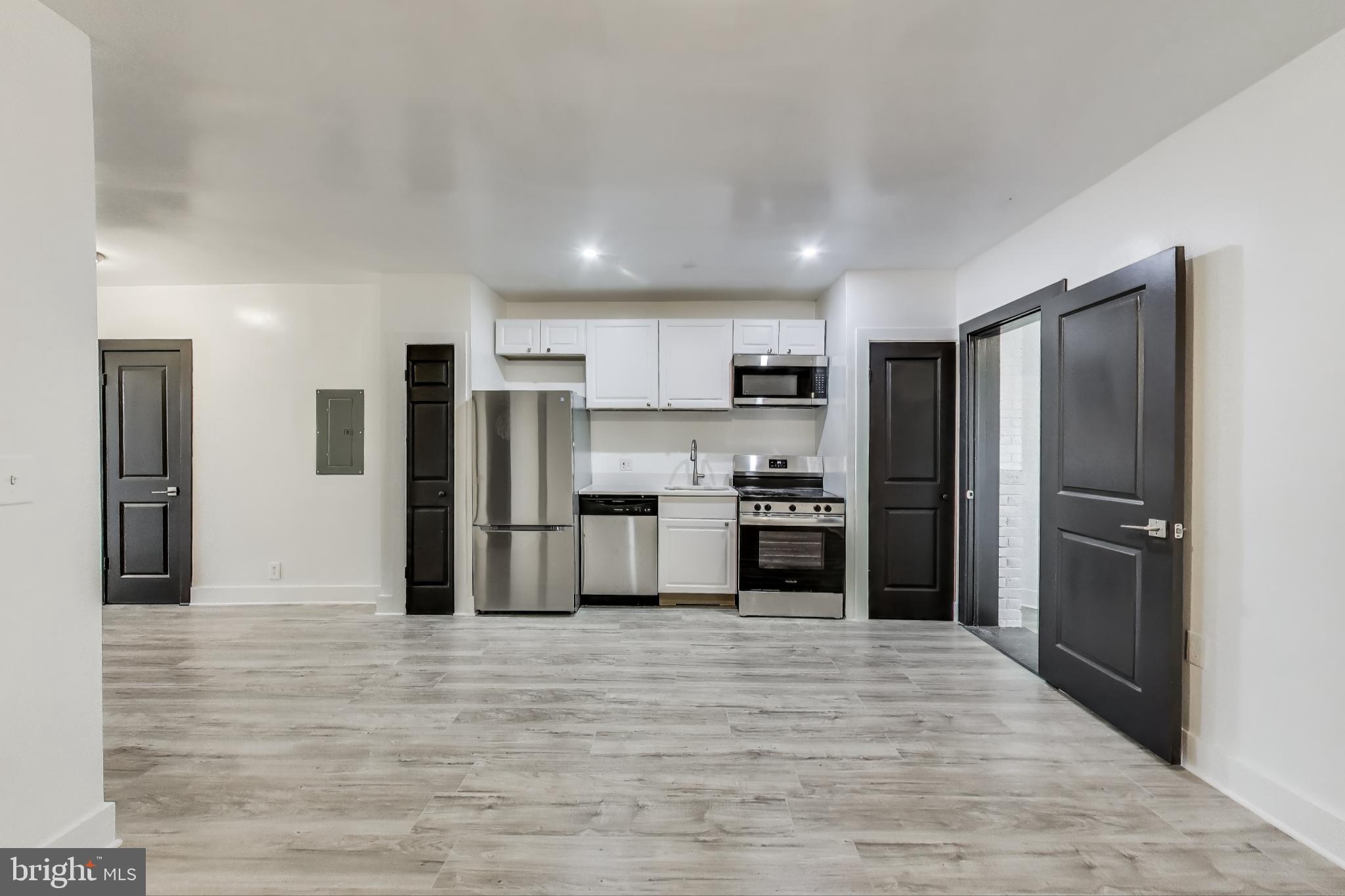 3918 10th Street Northeast, Unit 3 Washington, DC 20017 - Photo 23 of 69 a kitchen with stainless steel appliances a refrigerator and a stove