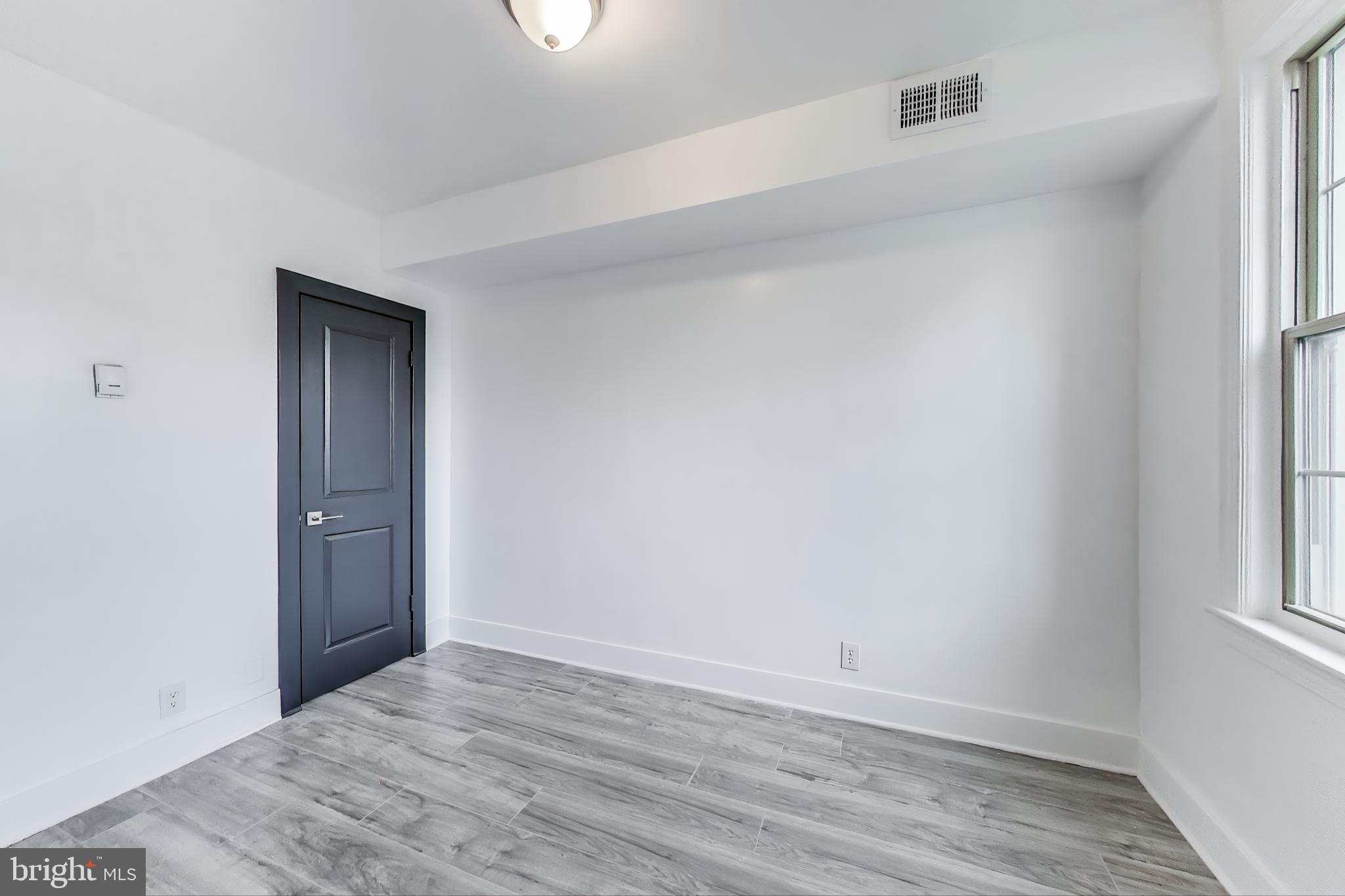 3918 10th Street Northeast, Unit 3 Washington, DC 20017 - Photo 25 of 69 wooden floor in an empty room