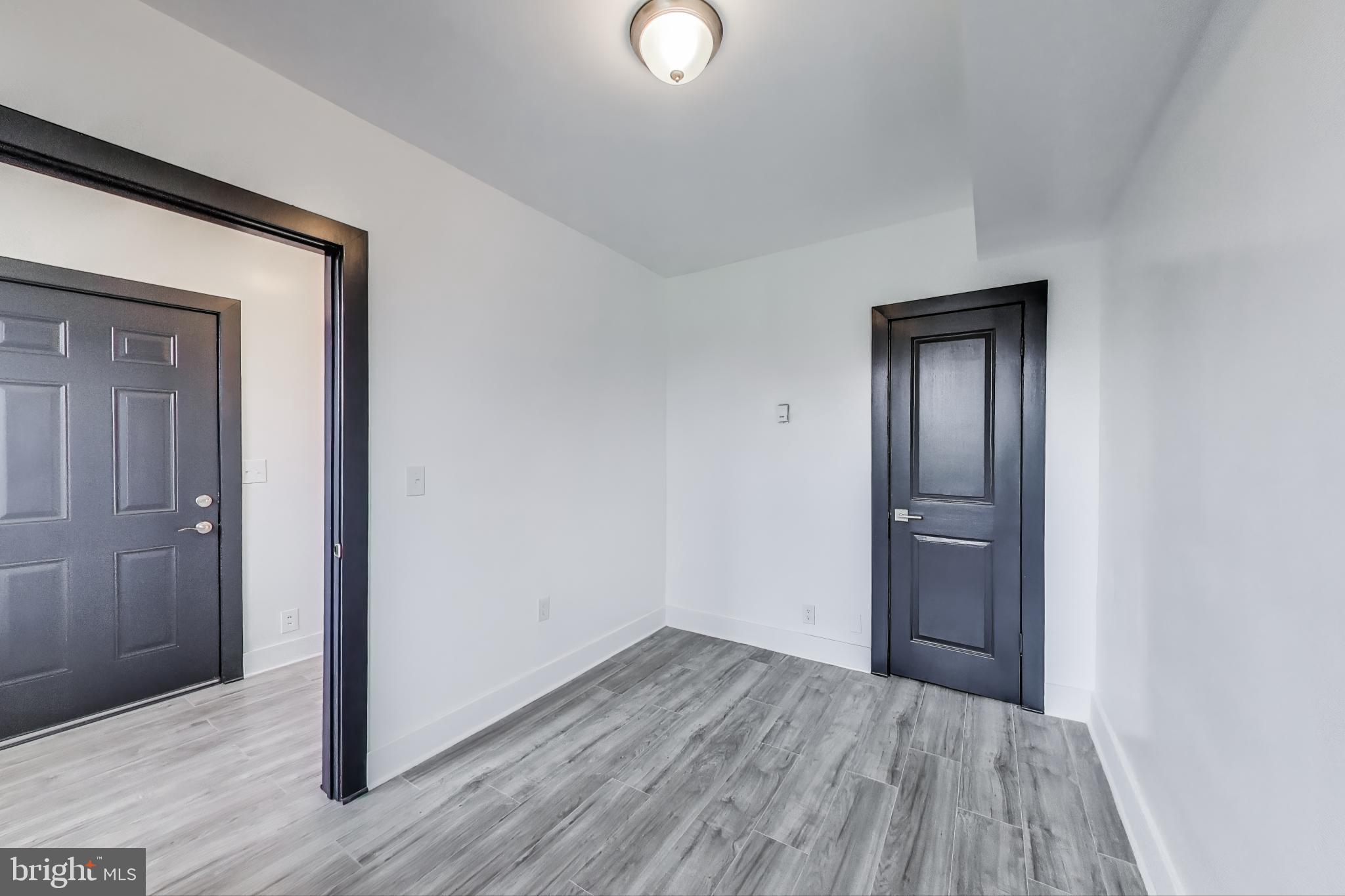 3918 10th Street Northeast, Unit 3 Washington, DC 20017 - Photo 27 of 69 a view of empty room with wooden floor