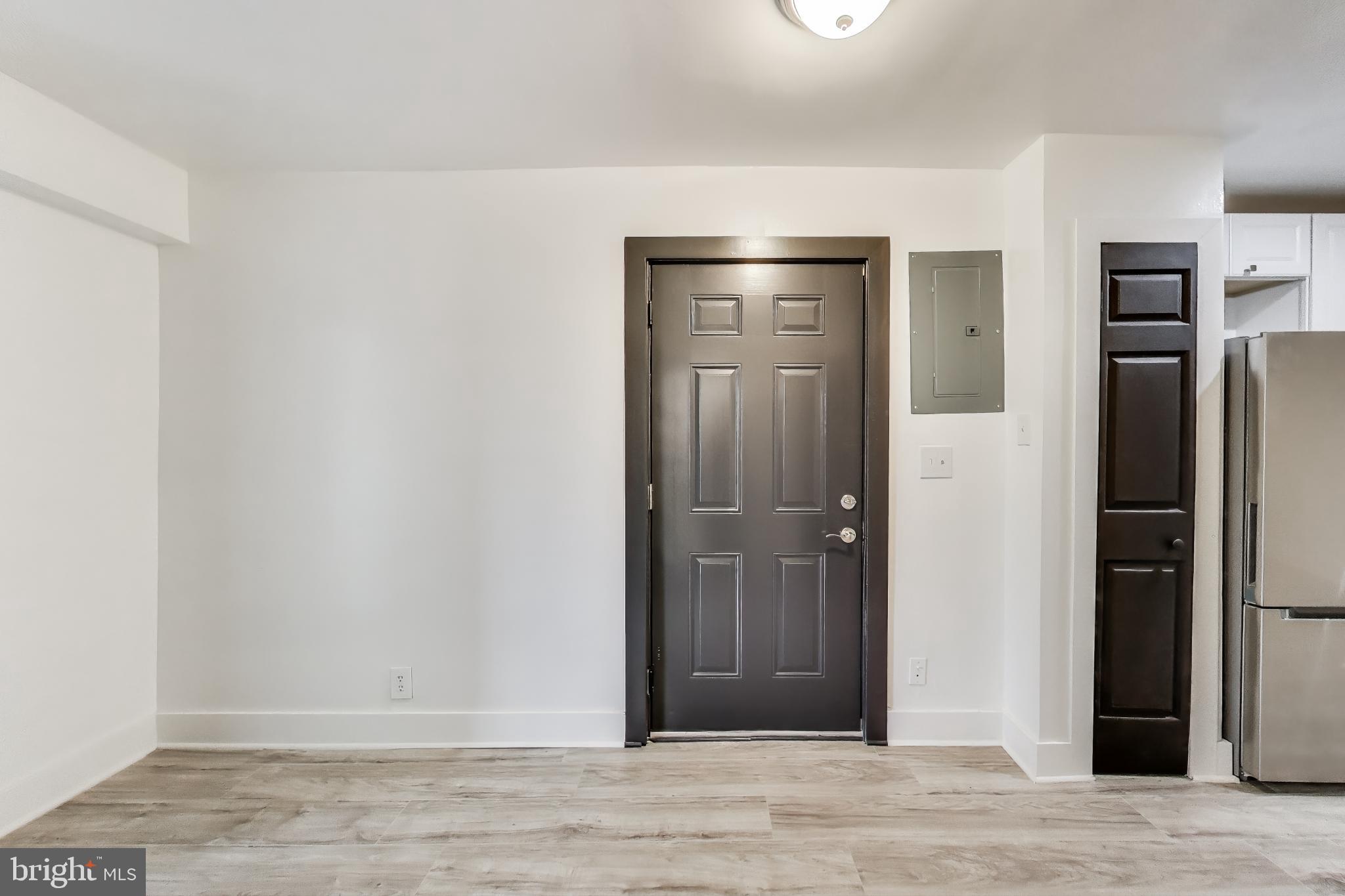3918 10th Street Northeast, Unit 3 Washington, DC 20017 - Photo 51 of 69 a view of an empty room with wooden floor