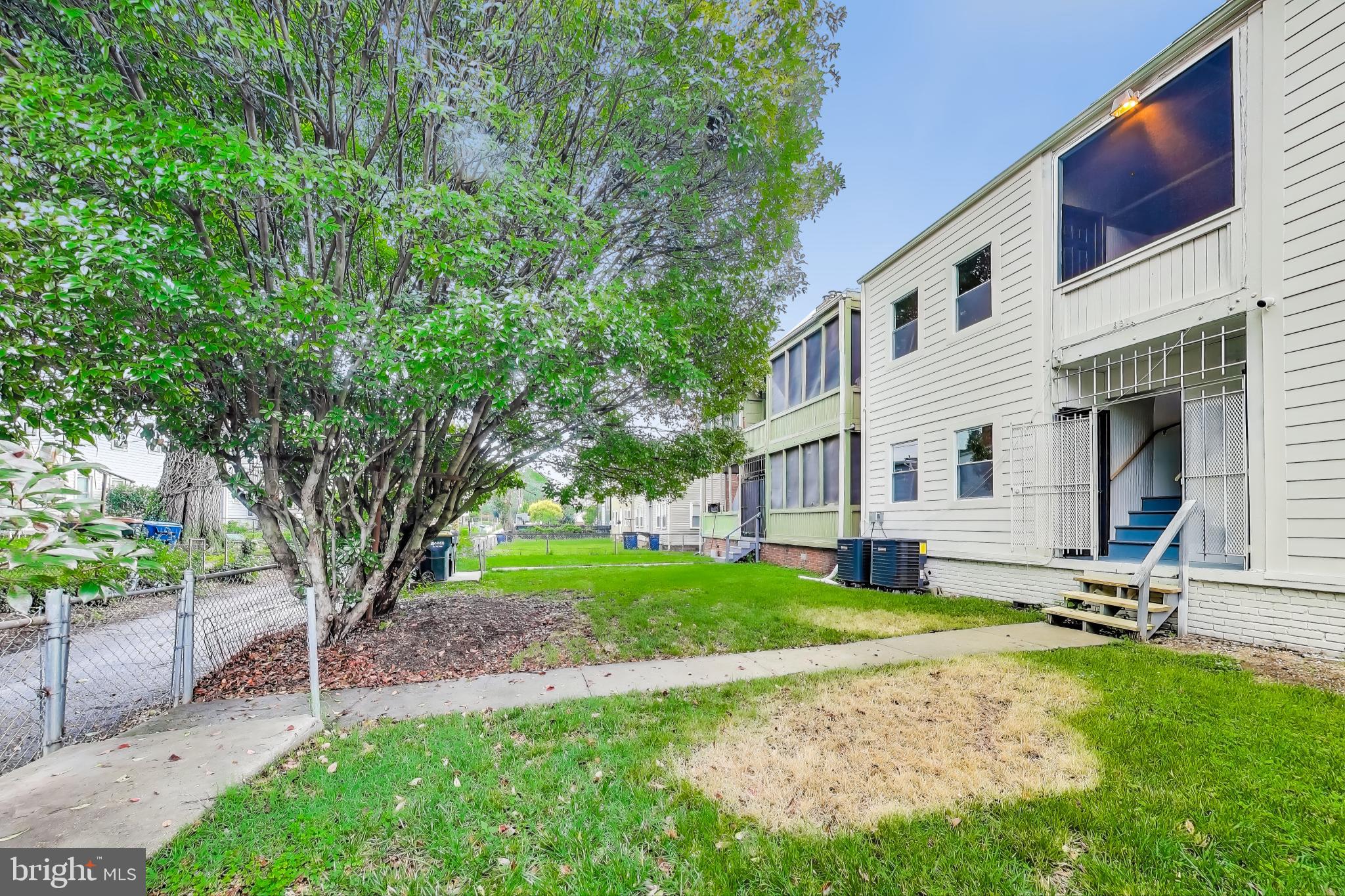 3918 10th Street Northeast, Unit 3 Washington, DC 20017 - Photo 67 of 69 a view of a house with backyard and a tree