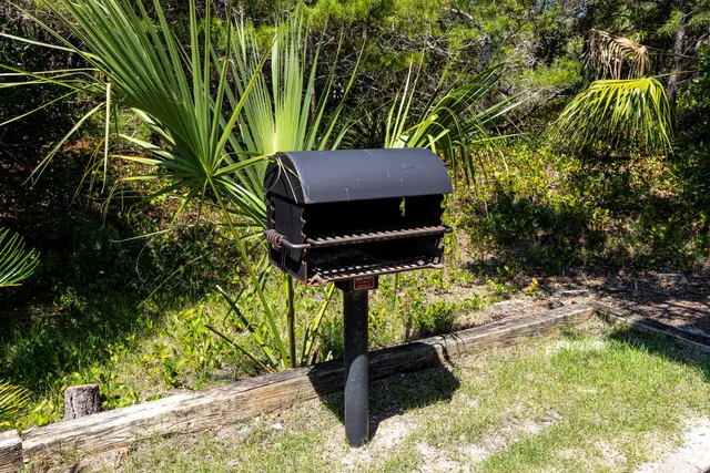 a view of a chair and table in the patio