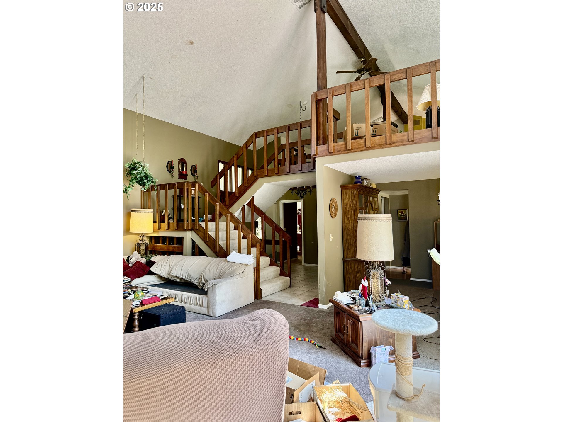275 Northeast Scott Drive Gresham, OR 97030 - Photo 12 of 27 a living room with furniture and a ceiling fan