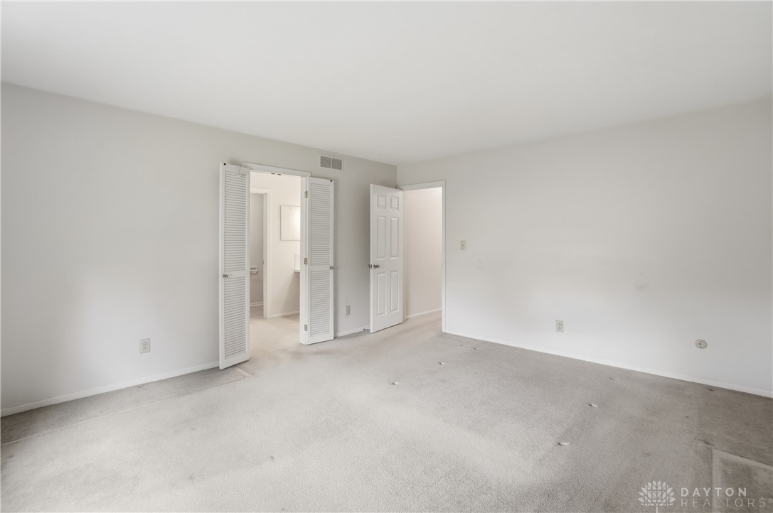 9964 Hummingbird Way Dayton, OH 45458 - Photo 31 of 57 This bright and airy room offers a versatile space, ideal for peaceful slumber or quiet contemplation.