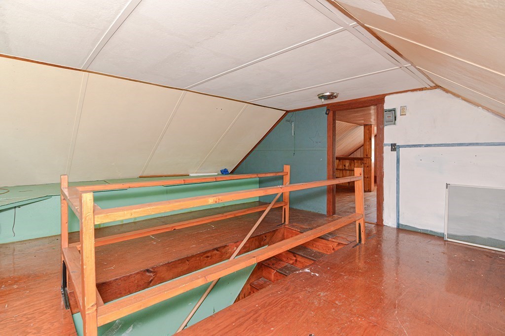 342 Providence Road Grafton, MA 01560 - Photo 19 of 40 a view of walk in closet with empty racks