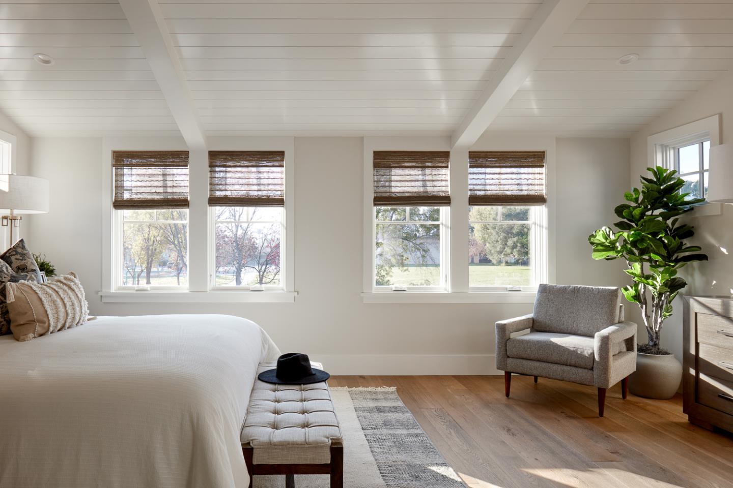 2108 Cully Place San Jose, CA 95124 - Photo 17 of 35 a bedroom with a bed and a couch next to a window